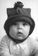I love this picture of Jerome! He had just woken up, still had his pj's on, and was playing with Daddy in bed. We put the hat on him to see if it fit yet.
